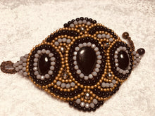 Carica l'immagine nel visualizzatore di Gallery, Bracciale allacciato semirigido