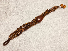 Carica l'immagine nel visualizzatore di Gallery, Bracciale allacciato a 4 fili variante giallo-arancio
