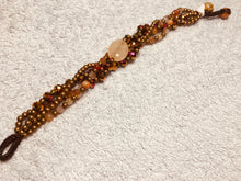 Carica l'immagine nel visualizzatore di Gallery, Bracciale allacciato a 4 fili variante giallo-arancio