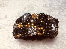 Carica l'immagine nel visualizzatore di Gallery, Bracciale a molla tipo fiorellini